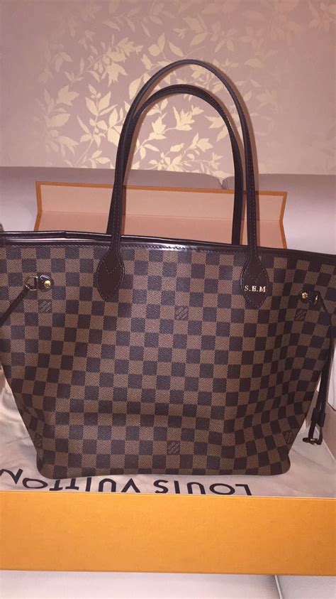 initials on lv bag